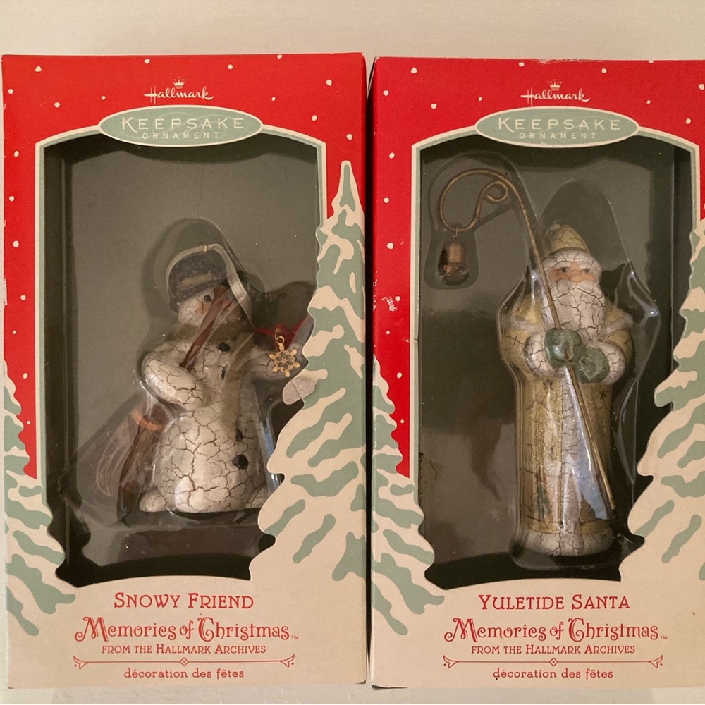 Pair of Hallmark”Memories of Christmas” collection.